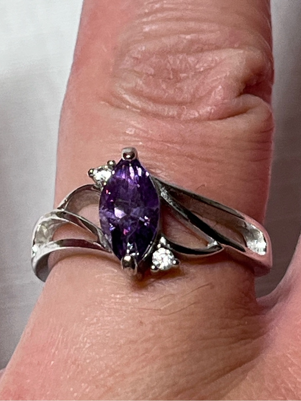 Sterling Silver Purple Marquise Gemstone Ring with Accent Stones
Size 7